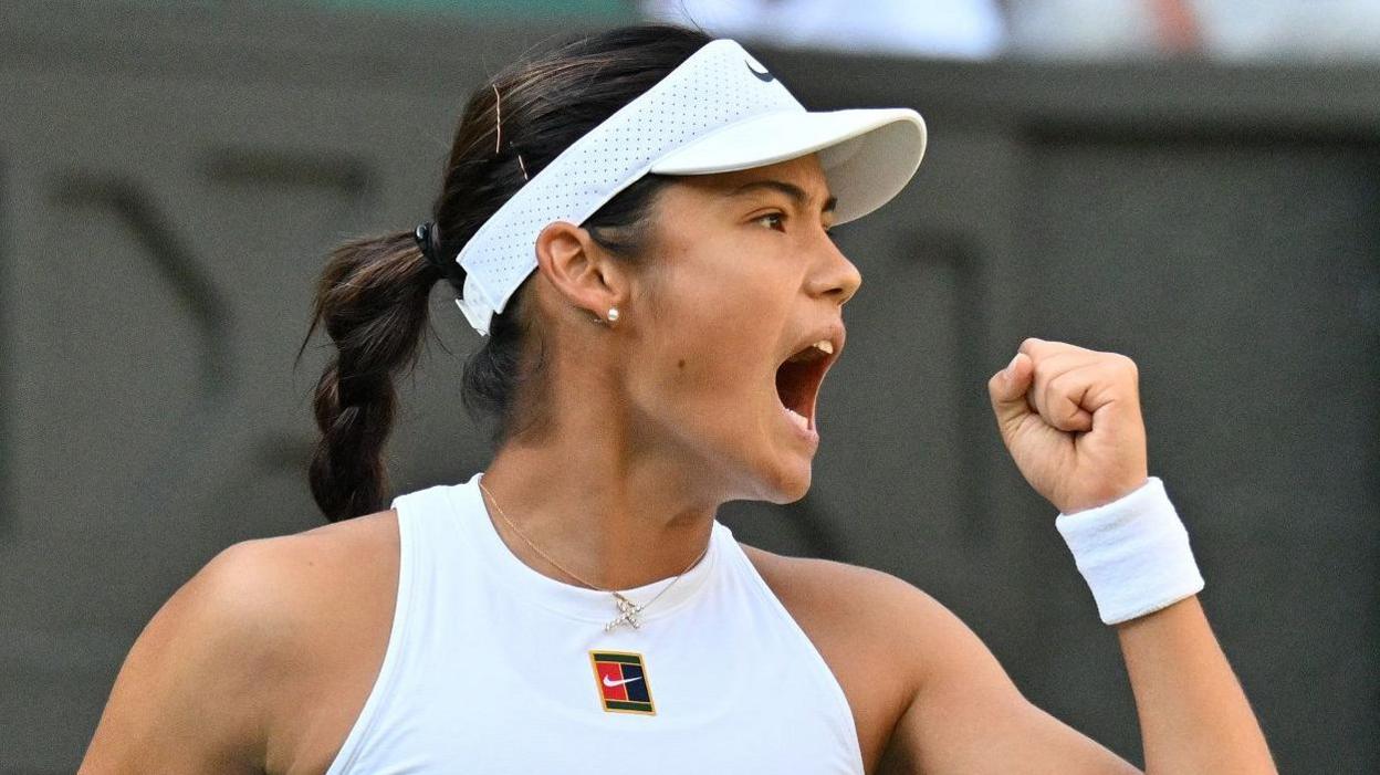 Emma Raducanu reacts after beating Marketa Vondrousova