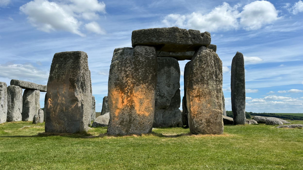 Stonehenge with orange powder on some of the stones