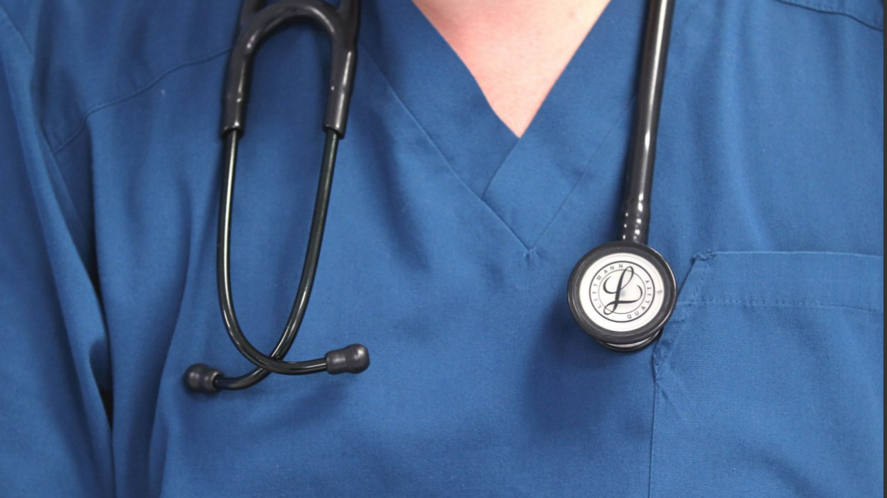 Library still of a stethoscope around a doctor's neck