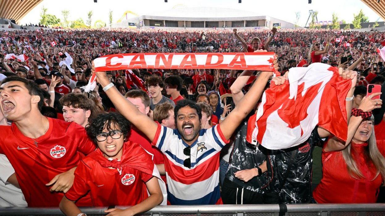 Canada fans cheer their team in Vancouver