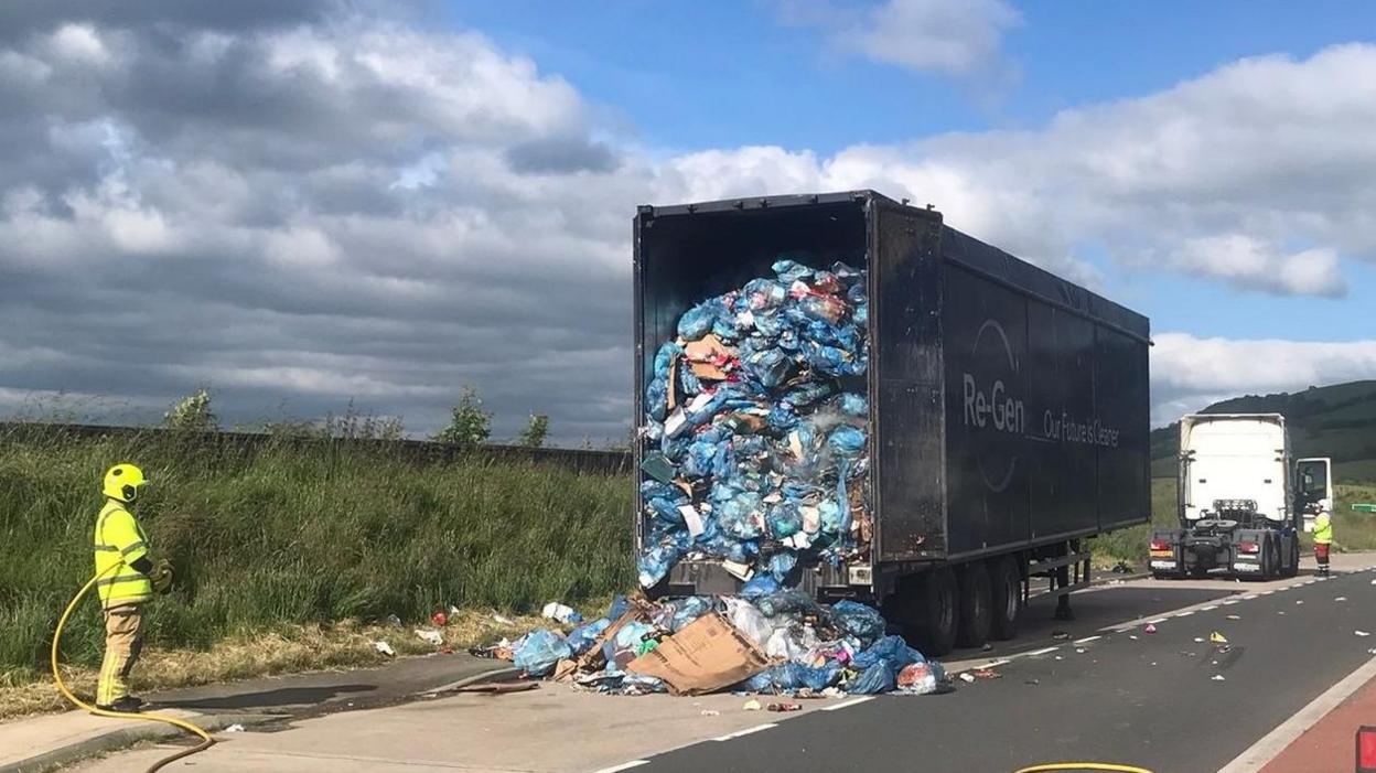 The road was closed while the emergency services made the scene safe