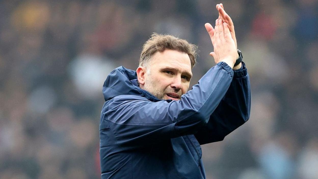 John Eustace claps the fans after Blackburn's defeat to Wolves in the FA Cup