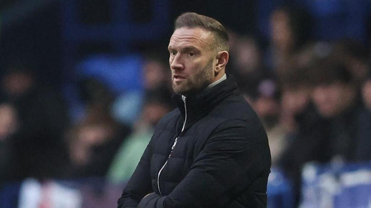 Ian Evatt on the touchline