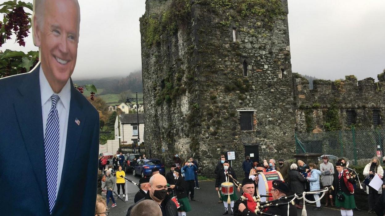 Joe Biden cut-out watches a parade in his honour in Carlingford