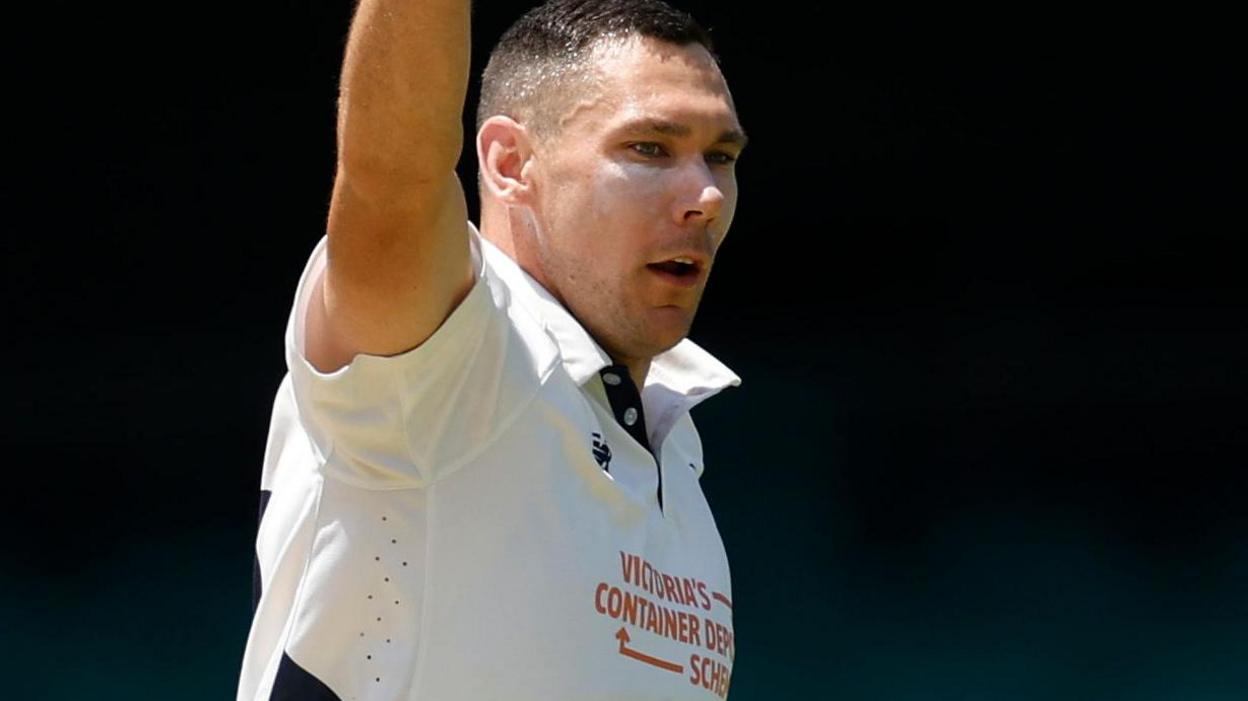 Scott Boland celebrates taking a wicket while playing for Victoria against New South Wales in the Sheffield Shield