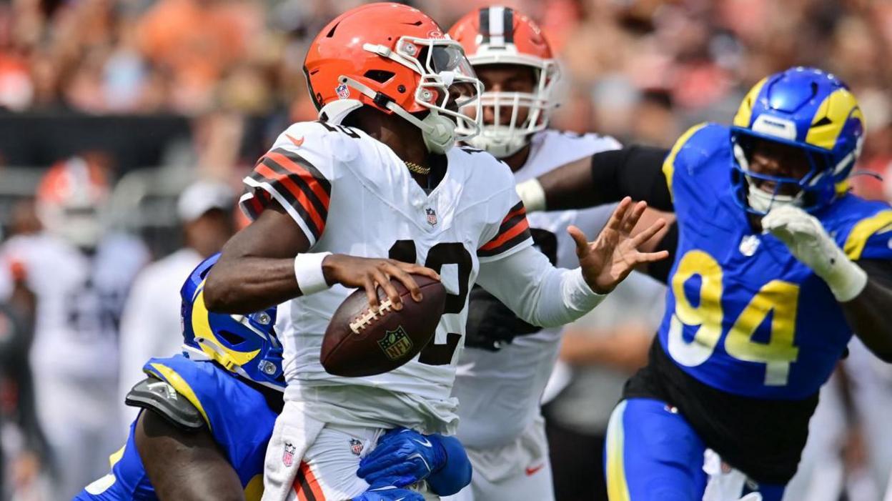 Los Angeles Rams linebacker Jamil Muhammad sacks Cleveland Browns quarterback Shedeur Sanders during their pre-season game in 2025