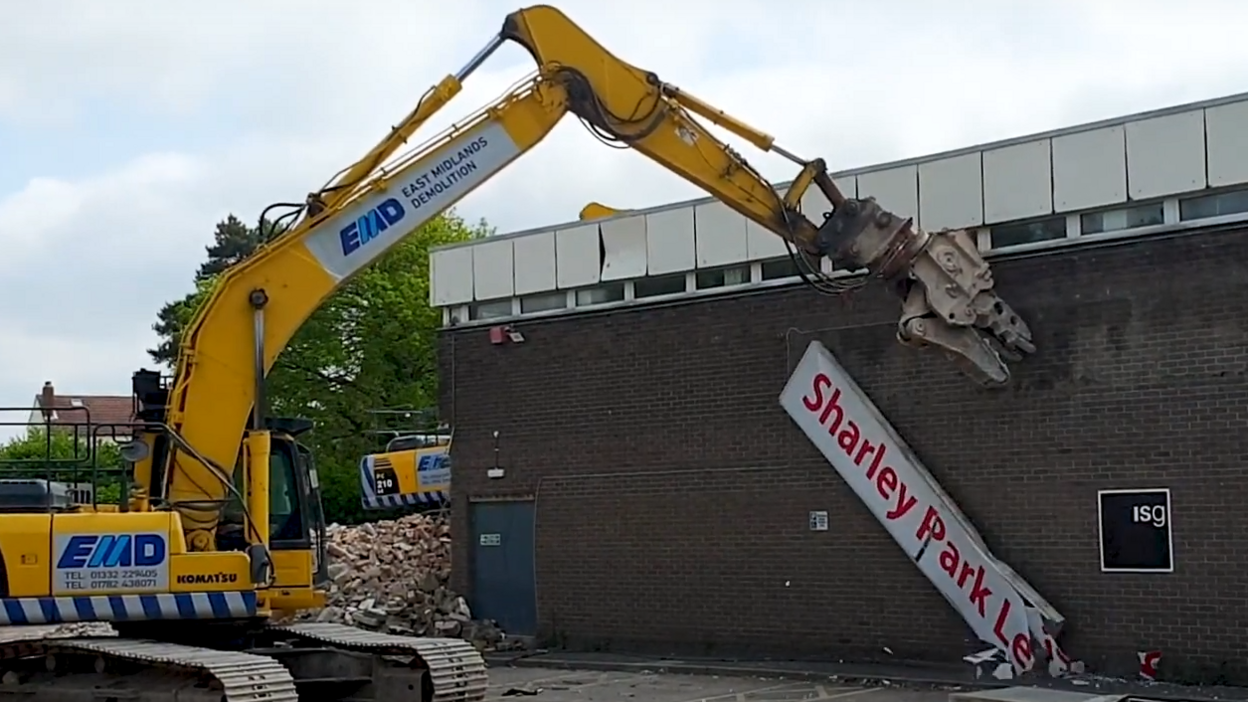 Image of a digger demolishing a leisure centre in Clay Cross