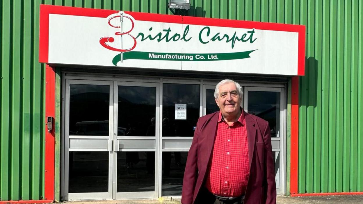 Image of David Gibbs outside Bristol Carpets