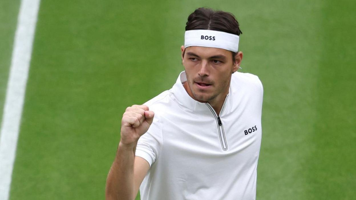 Taylor Fritz celebrates