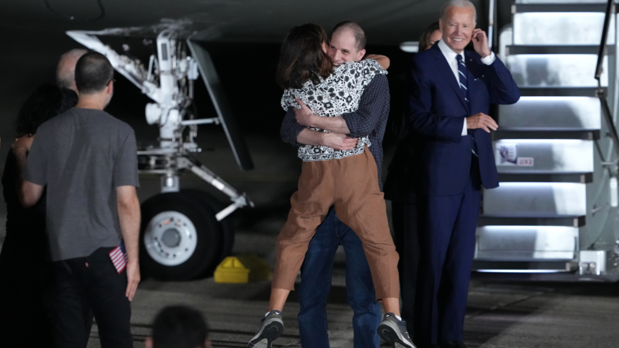 US President Joe Biden watched on as Evan Gershkovich gave his mother Ella Milman a huge hug after disembarking at Joint Base Andrews