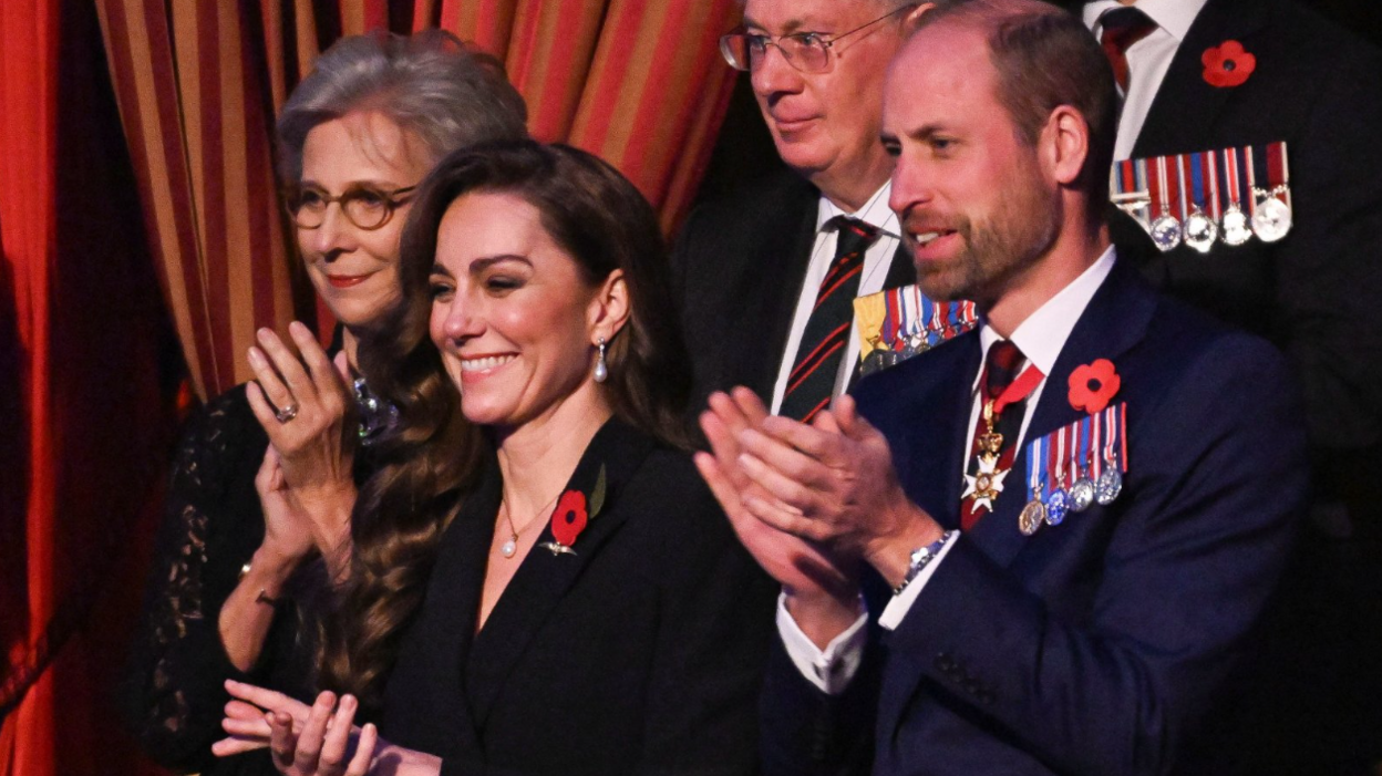 Catherine, the Princess of Wales stands next to the Prince of Wales in attendance at the Remembrance event.