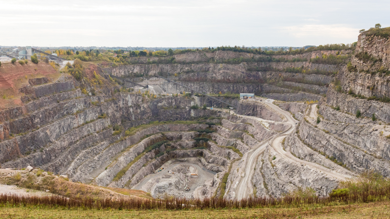 The centre of Croft Quarry, surrounded by high rock edges topped with grass