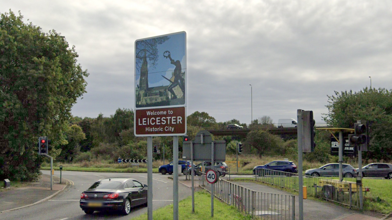 A Welcome to Leicester sign on the edge of the city
