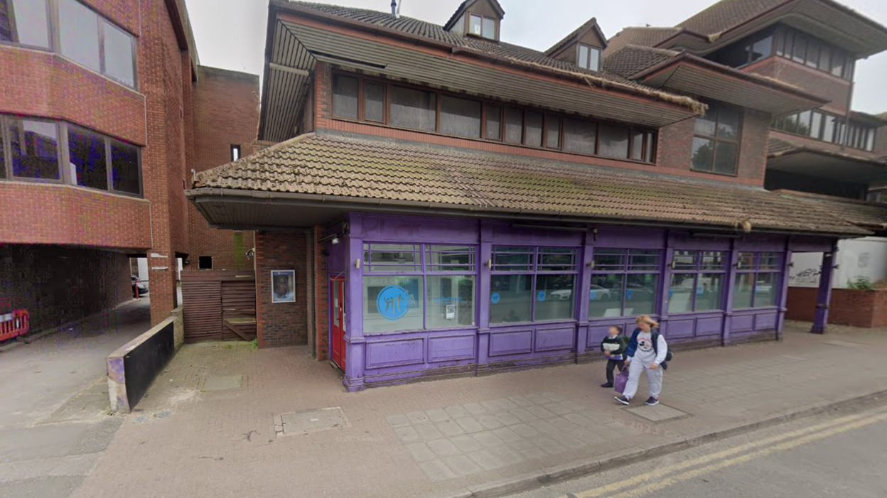 The purple frontage of the York Road Project's centre in Goldsworth Road, Woking.