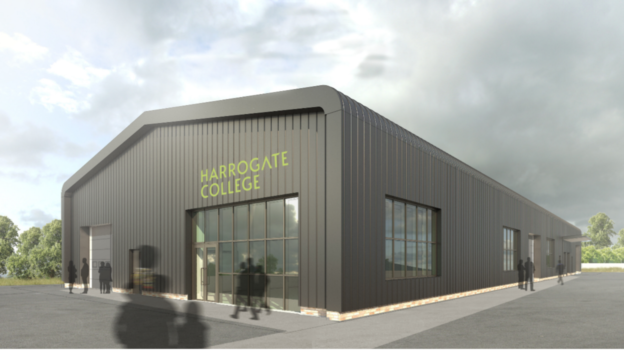 Concept image of Harrogate College’s proposed renewable energy technology centre- a dark grey warehouse style building.