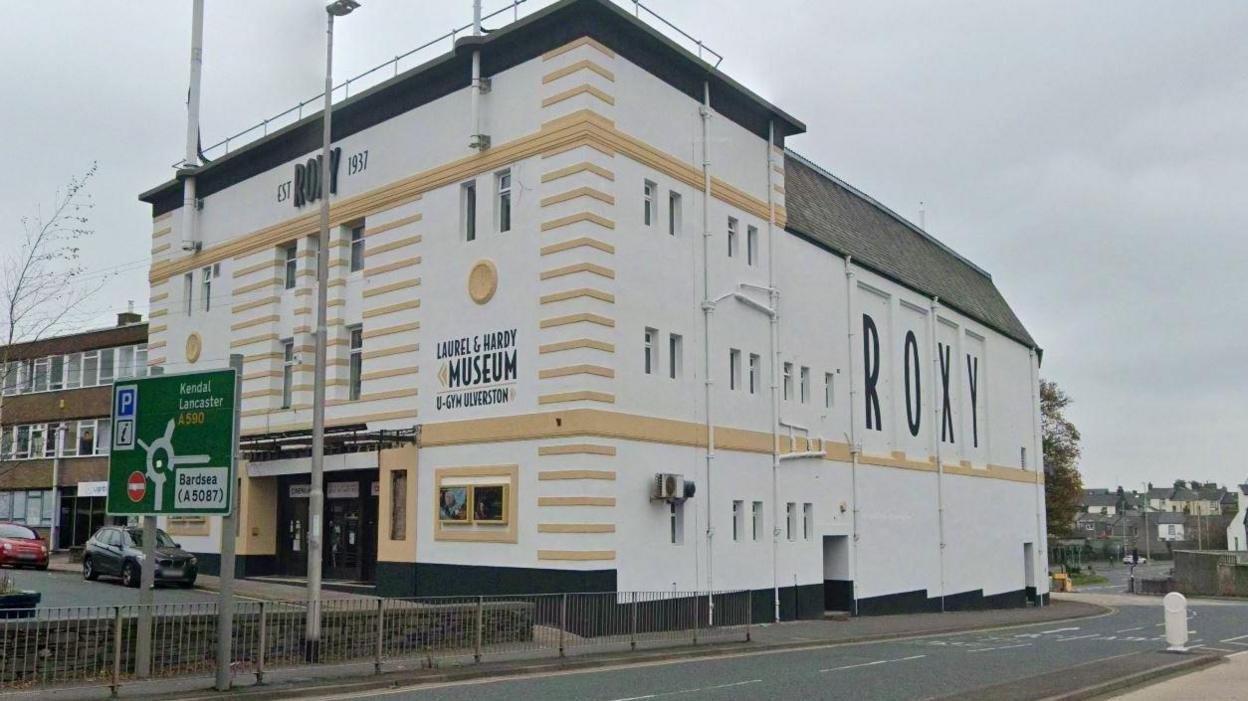 The Roxy in Ulverston - a large white and cream painted building that serves as a cinema, gym and museum.