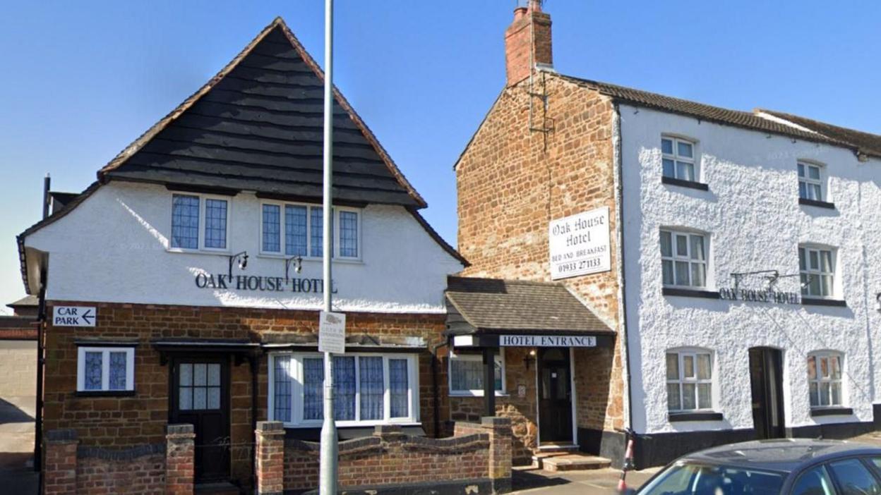 The Oak House Hotel in Wellingborough, two large white houses