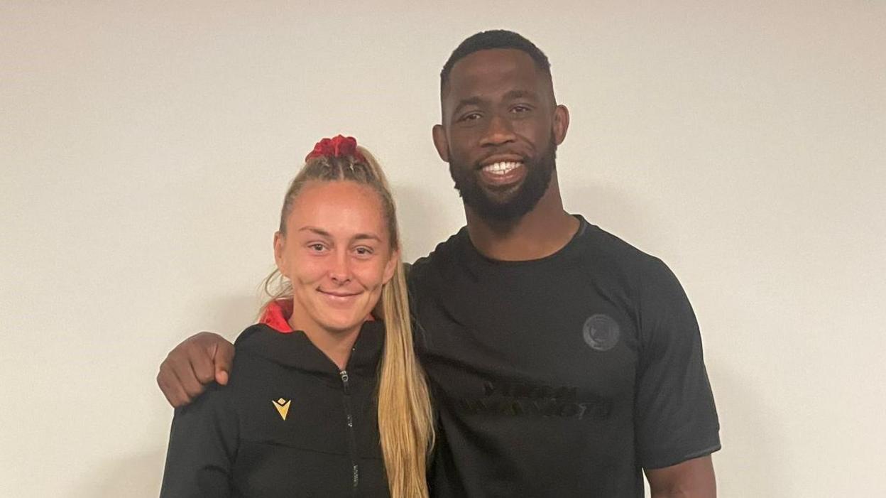 Wales captain Hannah Jones with Springbok Siya Kolisi