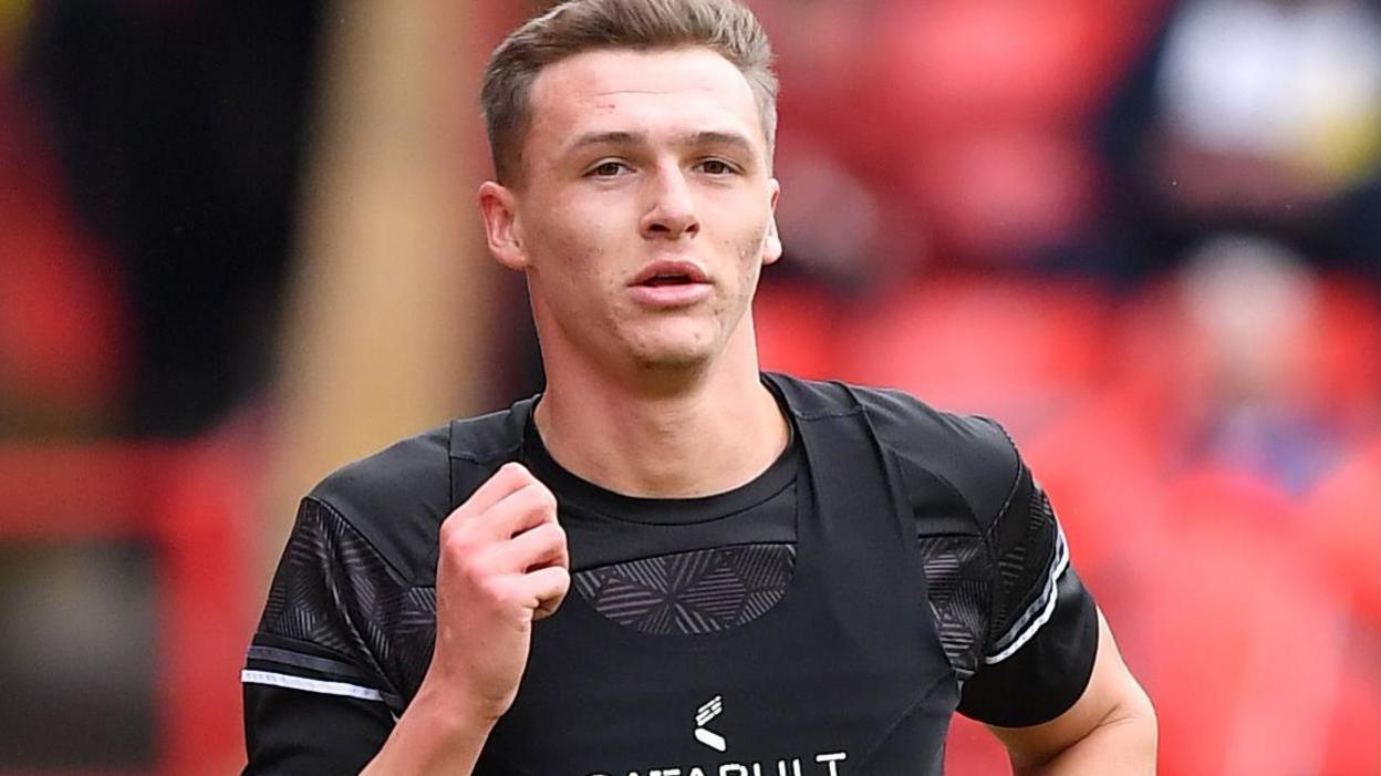 Jack Shepherd in action for Cheltenham Town