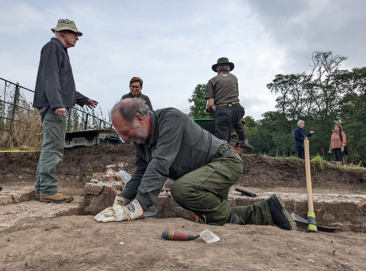 People carrying out archeological dig
