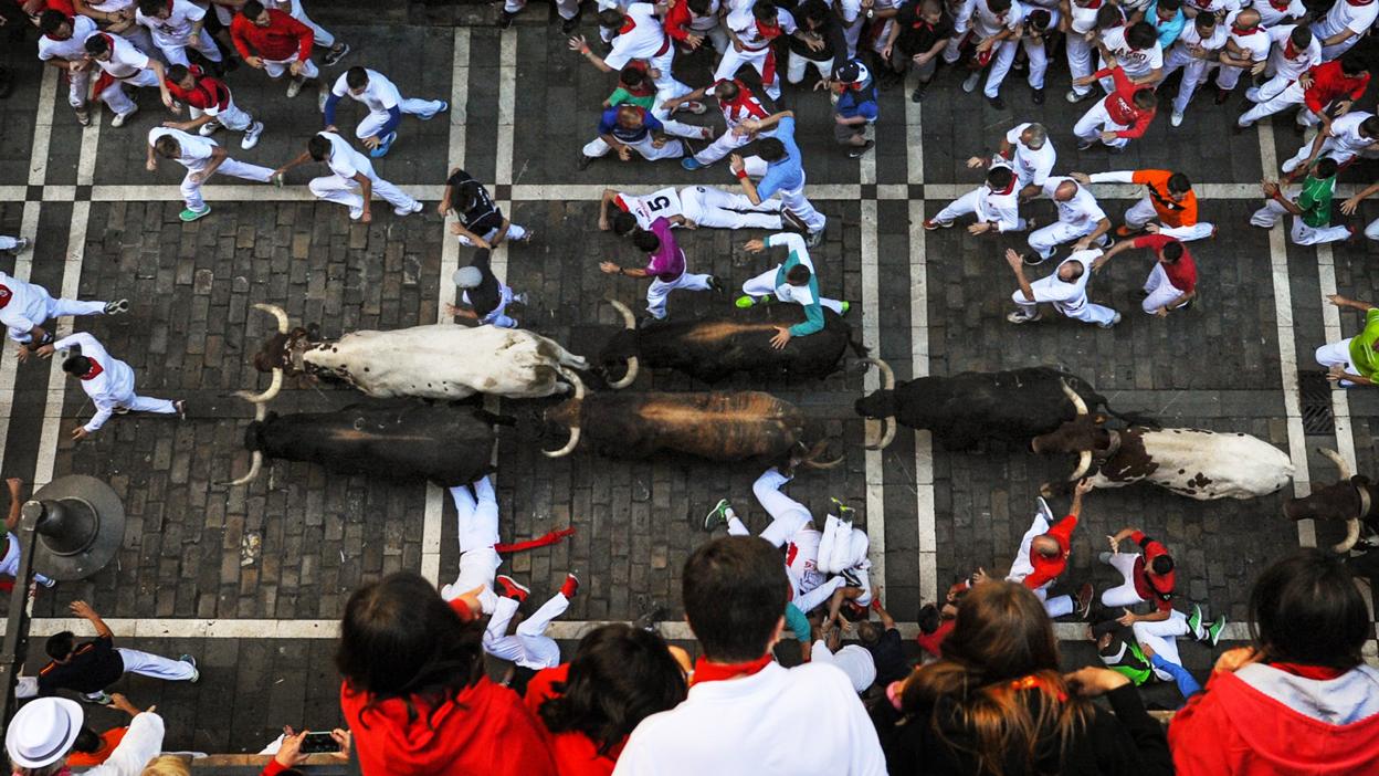 The bulls run through Pamplona