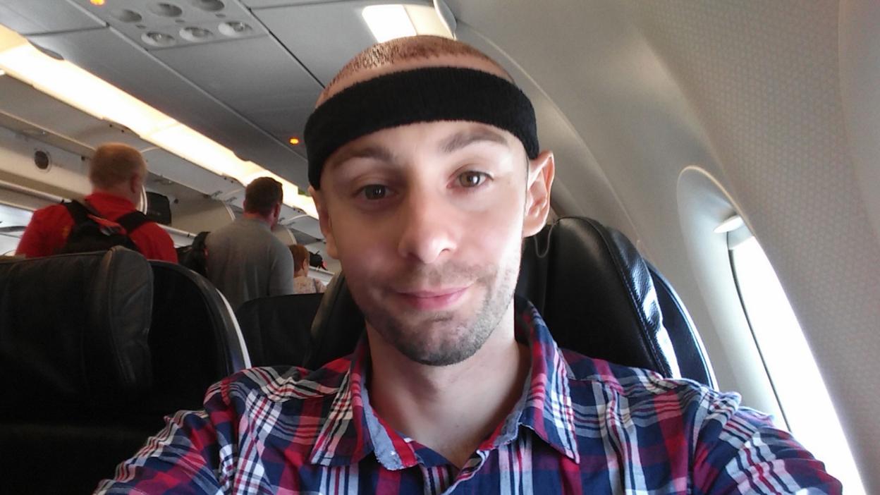 Chris on the plane back home.