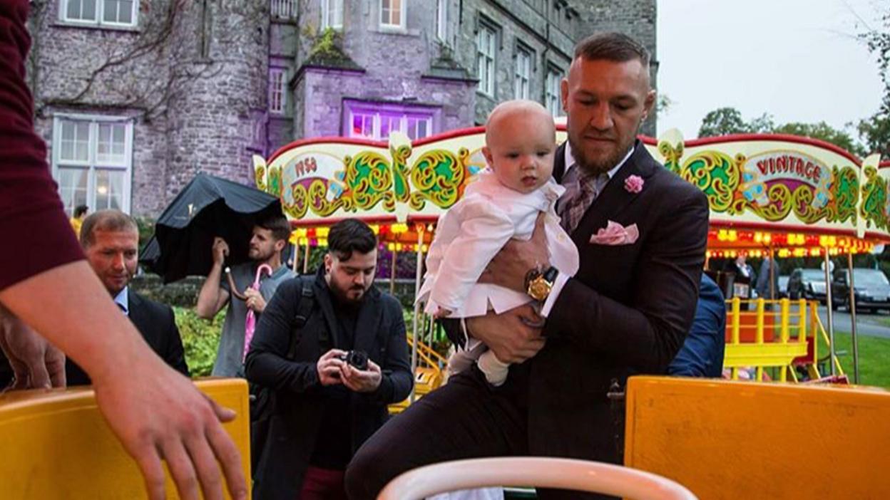 Conor McGregor with son Conor Jnr on fairground ride