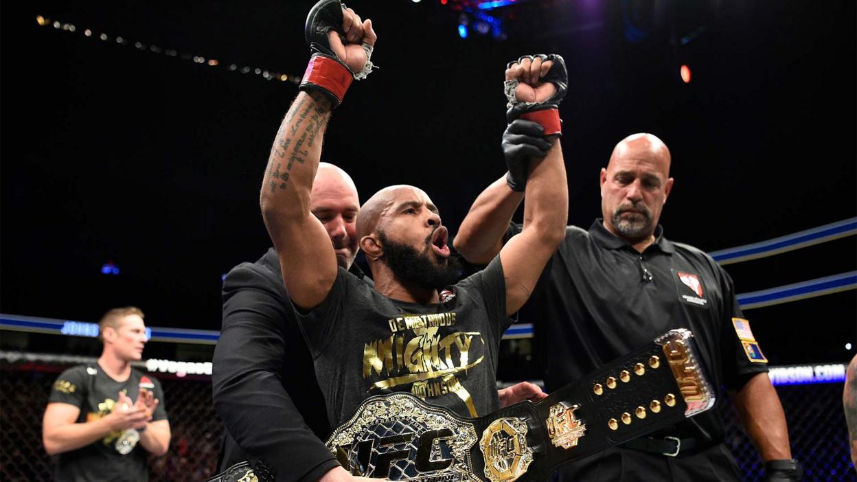 Demetrious Johnson celebrates at UFC 216