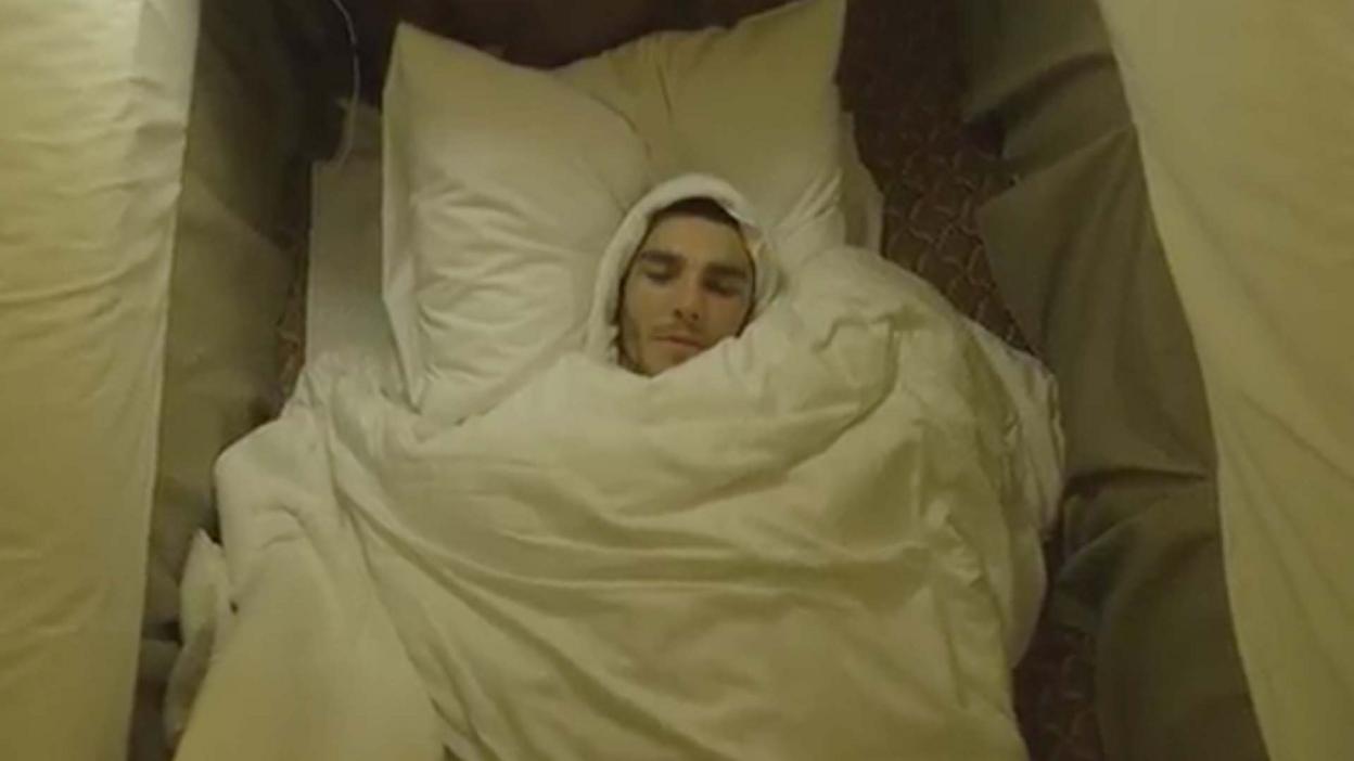 Dean Garnett wrapped in sheets