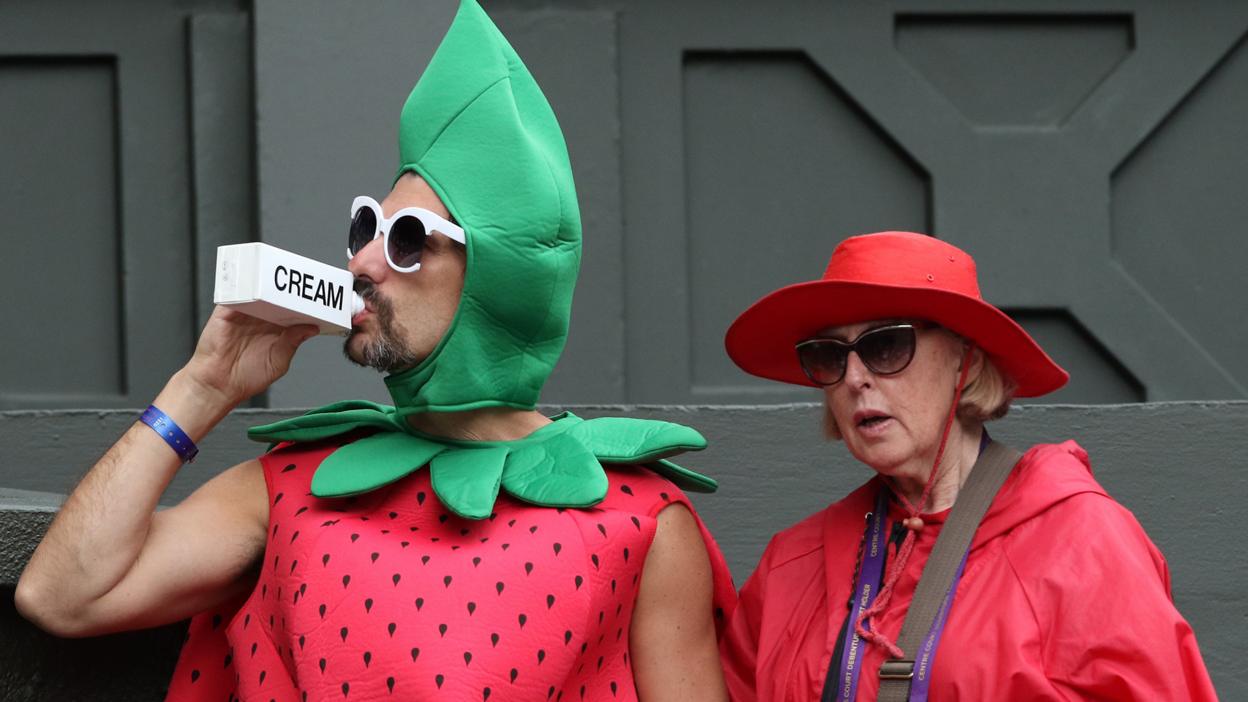 Man dressed as a strawberry at Wimbledon 2016