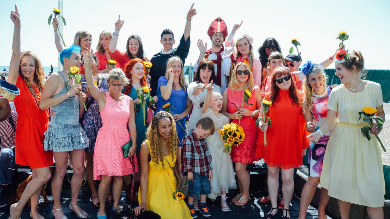 Wedding photo of Sophie with friends and family