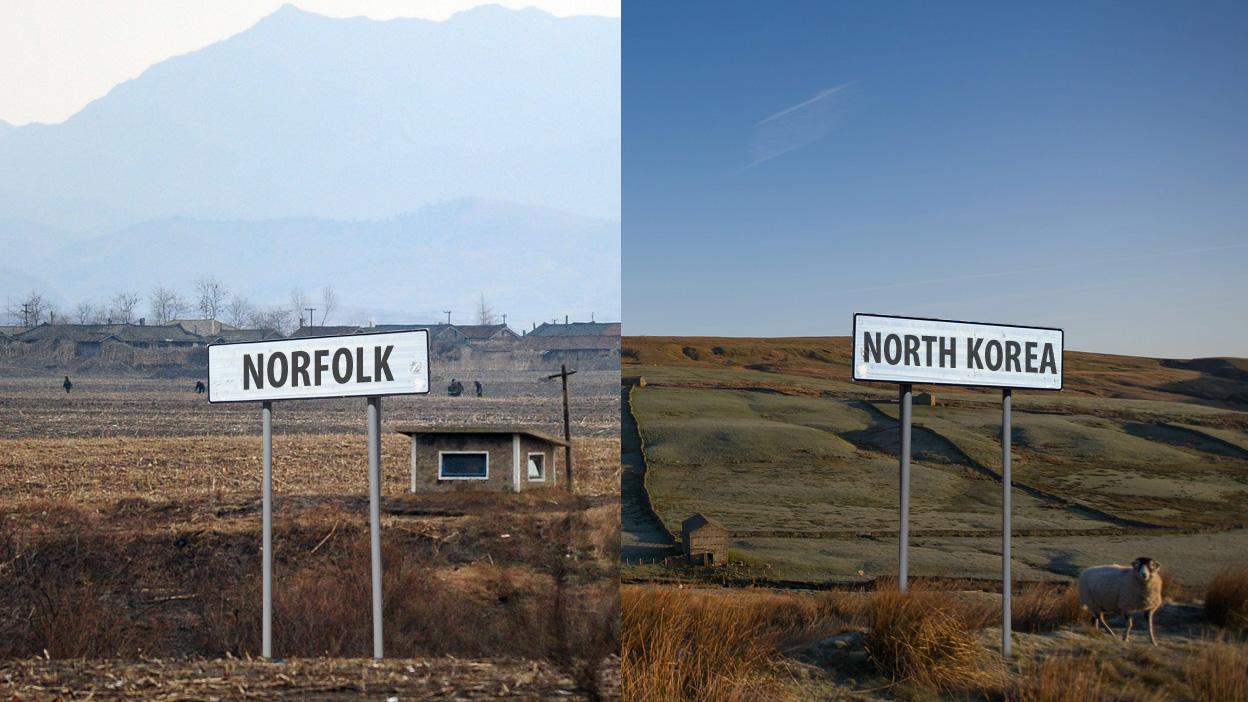 Signs saying Norfolk and North Korea on a hillside