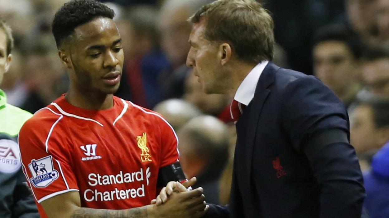 Liverpool forward Raheem Sterling with manager Brendan Rodgers