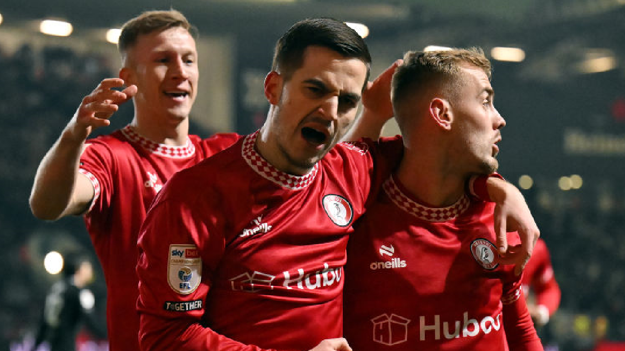 Anis Mehmeti and Mark Sykes celebrate Bristol City's opener against Stoke City