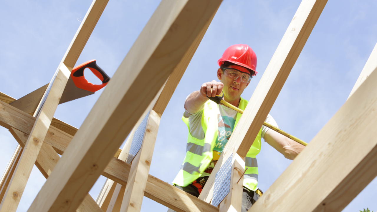 A workman on a roof