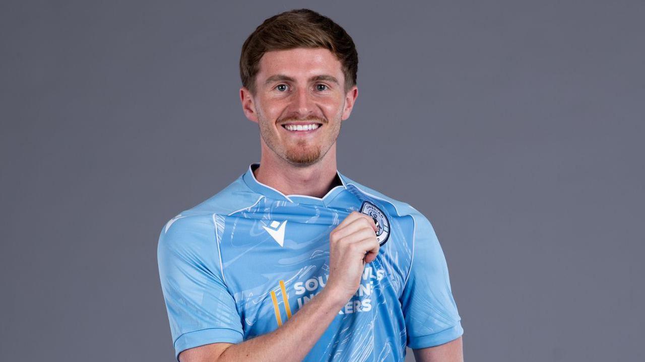 Alex John pictured in Cambrian's home kit