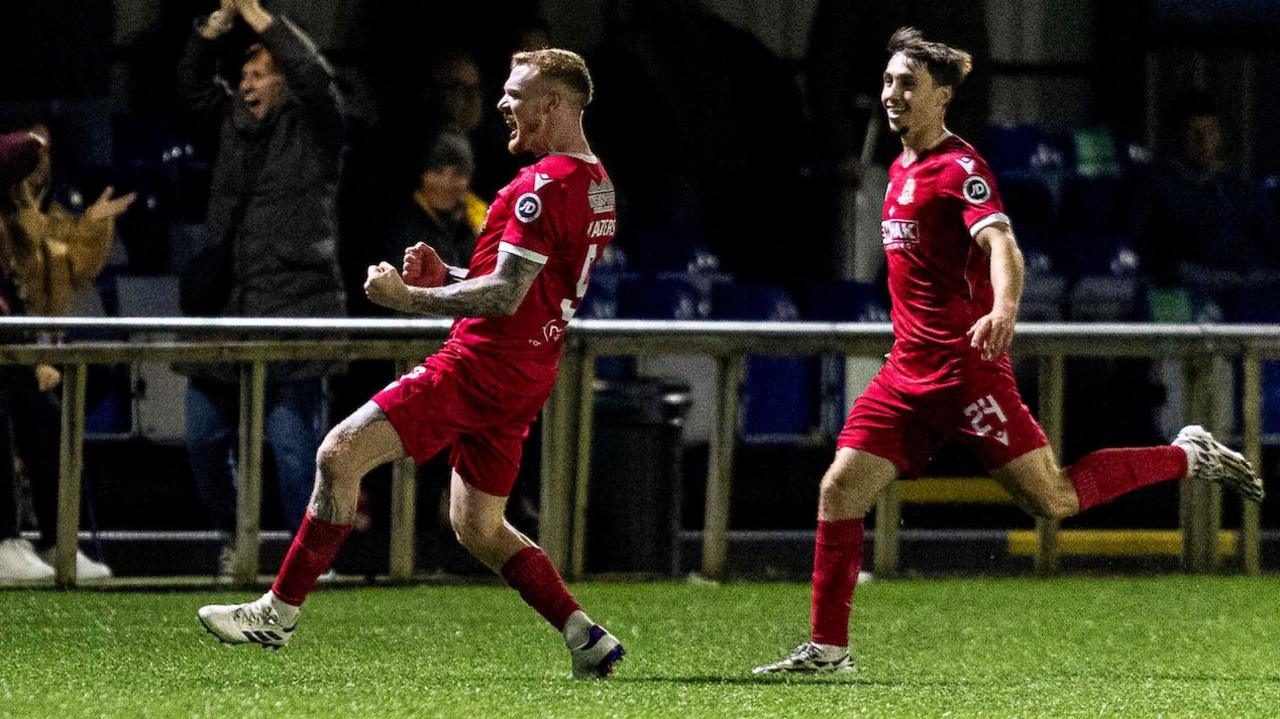 Briton Ferry's Tom Walters celebrates his winning strike against Penybont