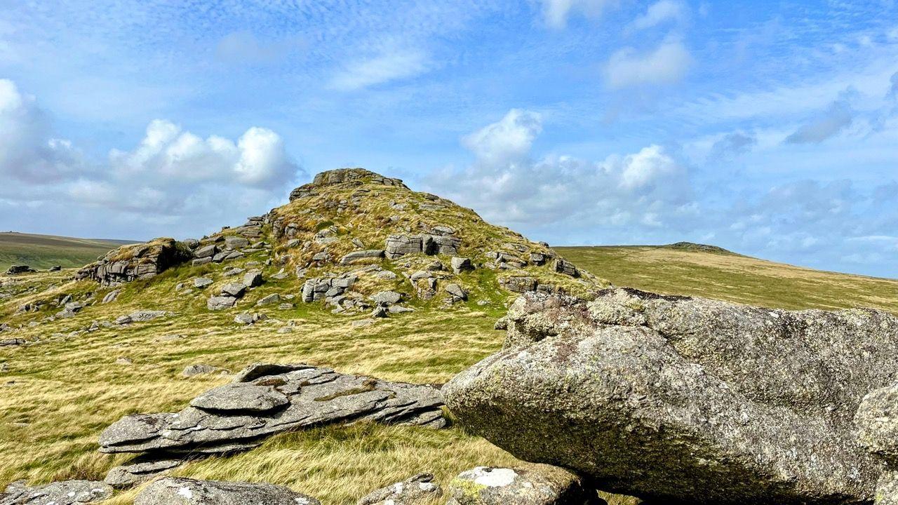 Longaford Tor on Dartmoor with granite rocks in the foreground