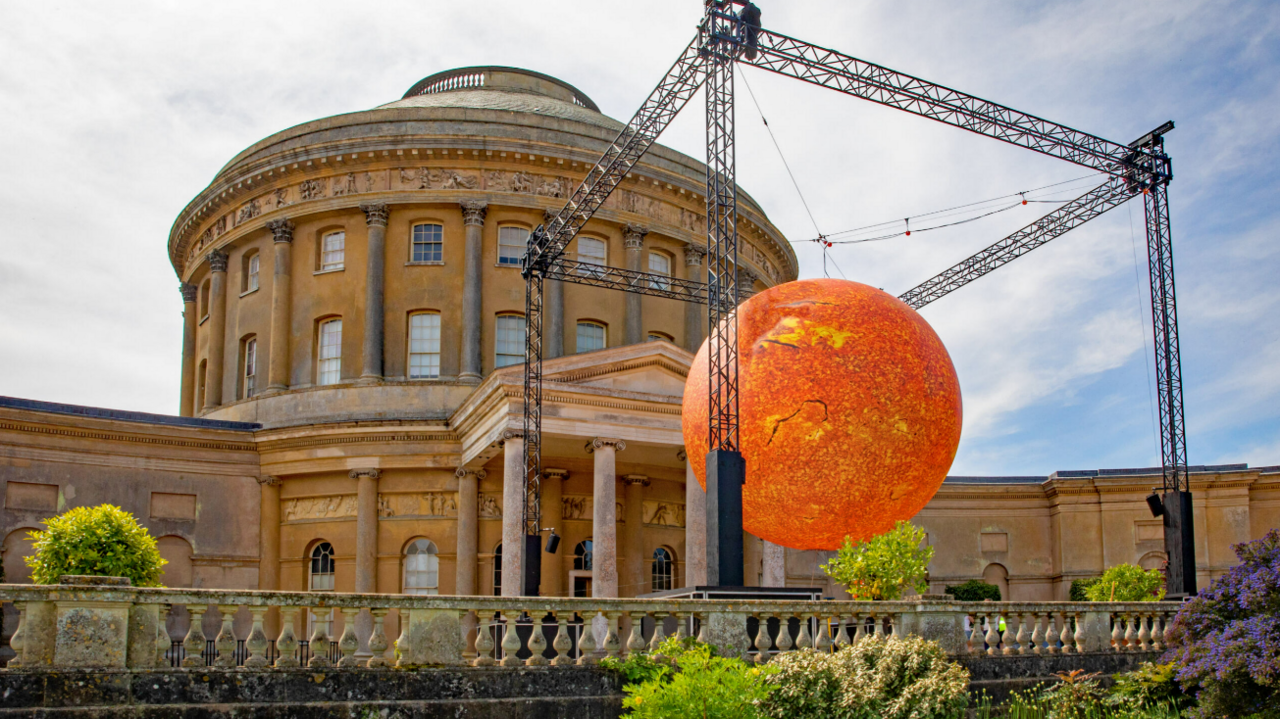 Another view of the Helios sculpture at Ickworth House. It hangs from a black metal sculpture.