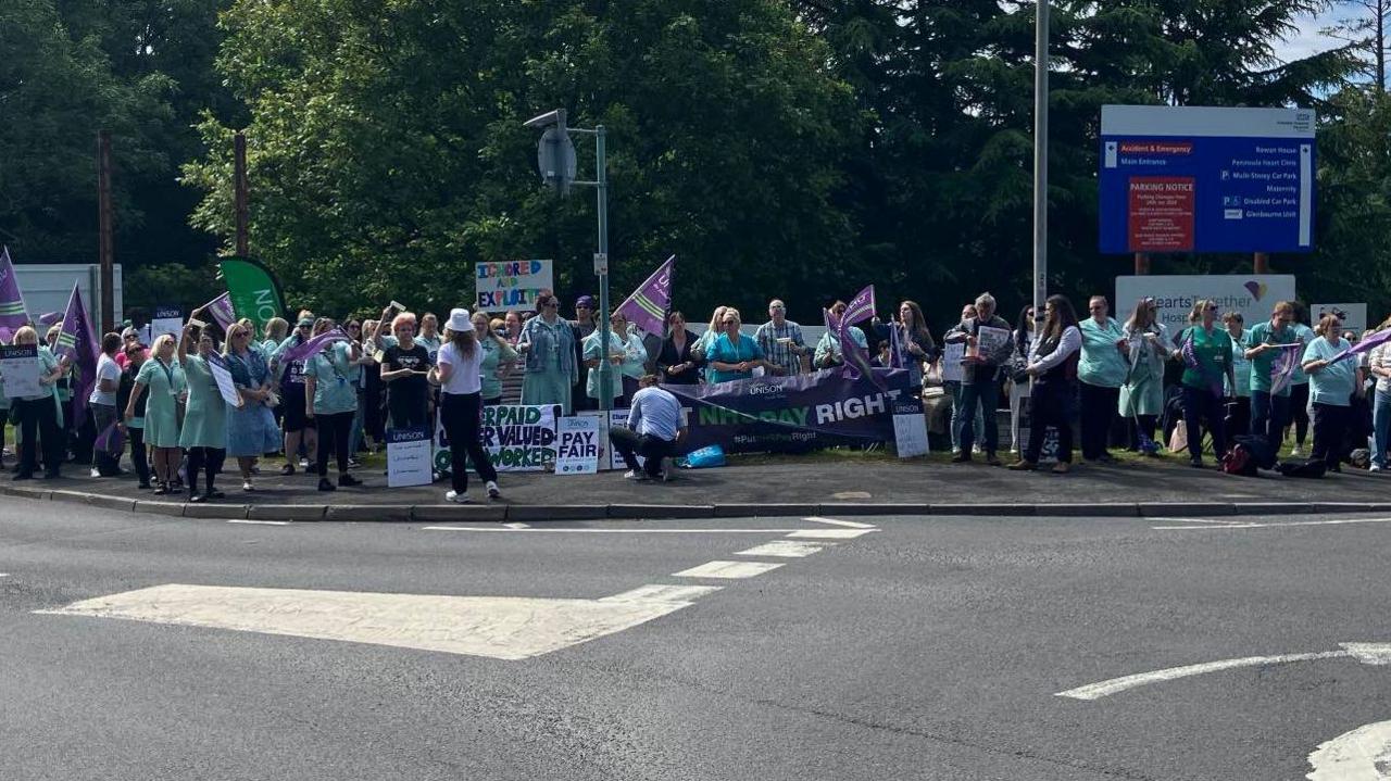 Healthcare workers taking strike action outside Derriford Hospital 