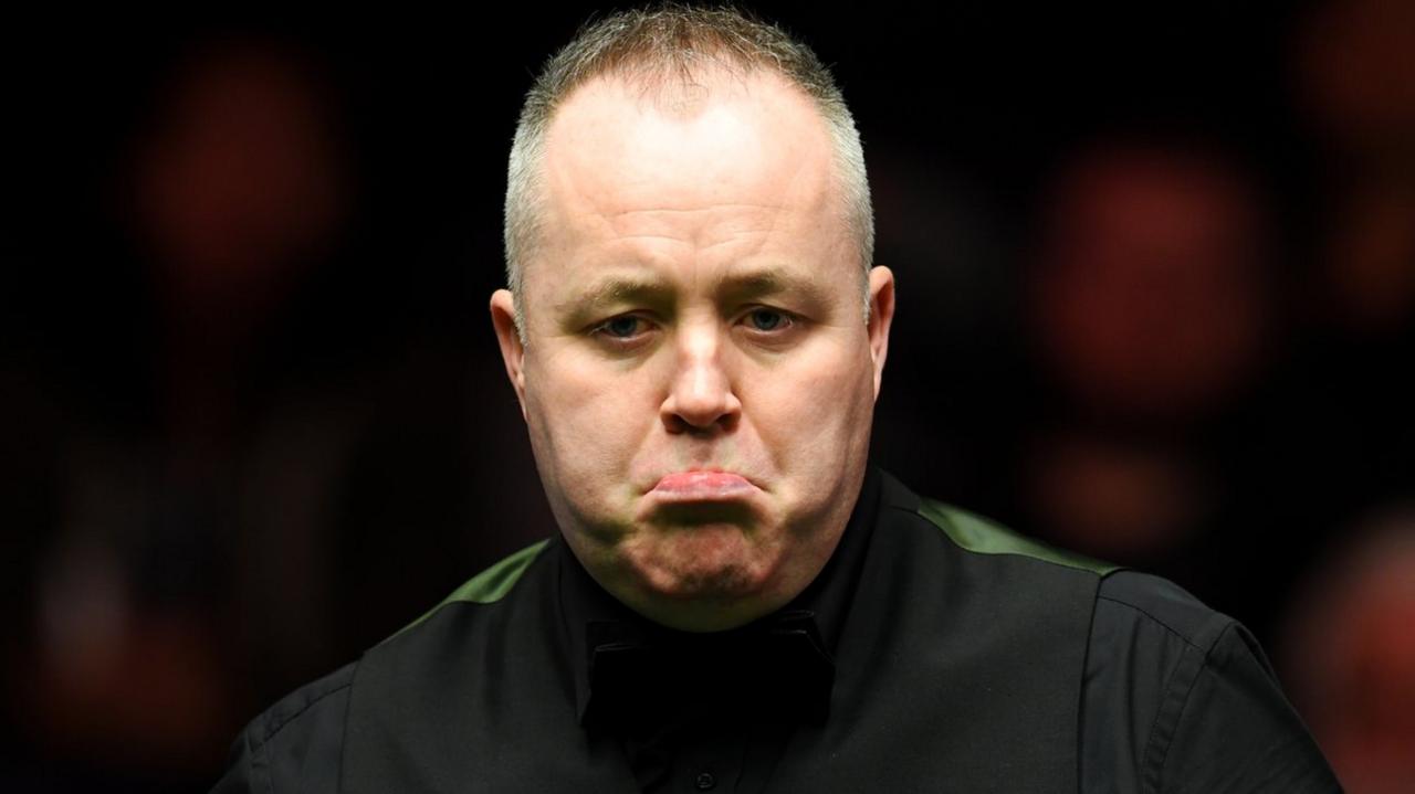 John Higgins played with a broken rib in Glasgow