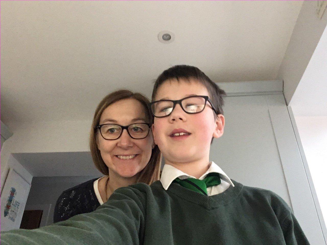 Image of a boy and mum wearing glasses