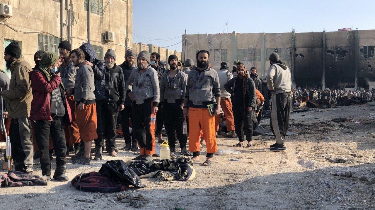 Photograph posted by SDF spokesman Farhad Shami showing suspected IS militants surrendering at Ghwayran prison in Hasaka, Syria (26 January 2022)