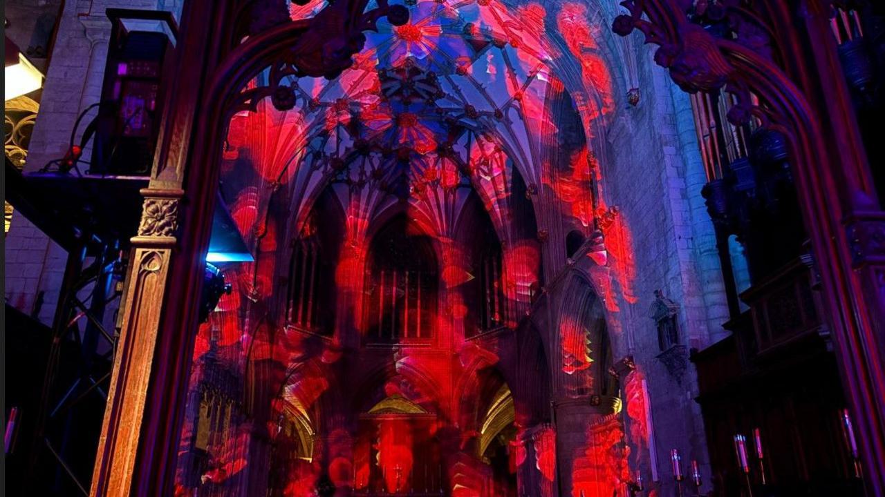 A light show on the walls and ceiling of the abbey