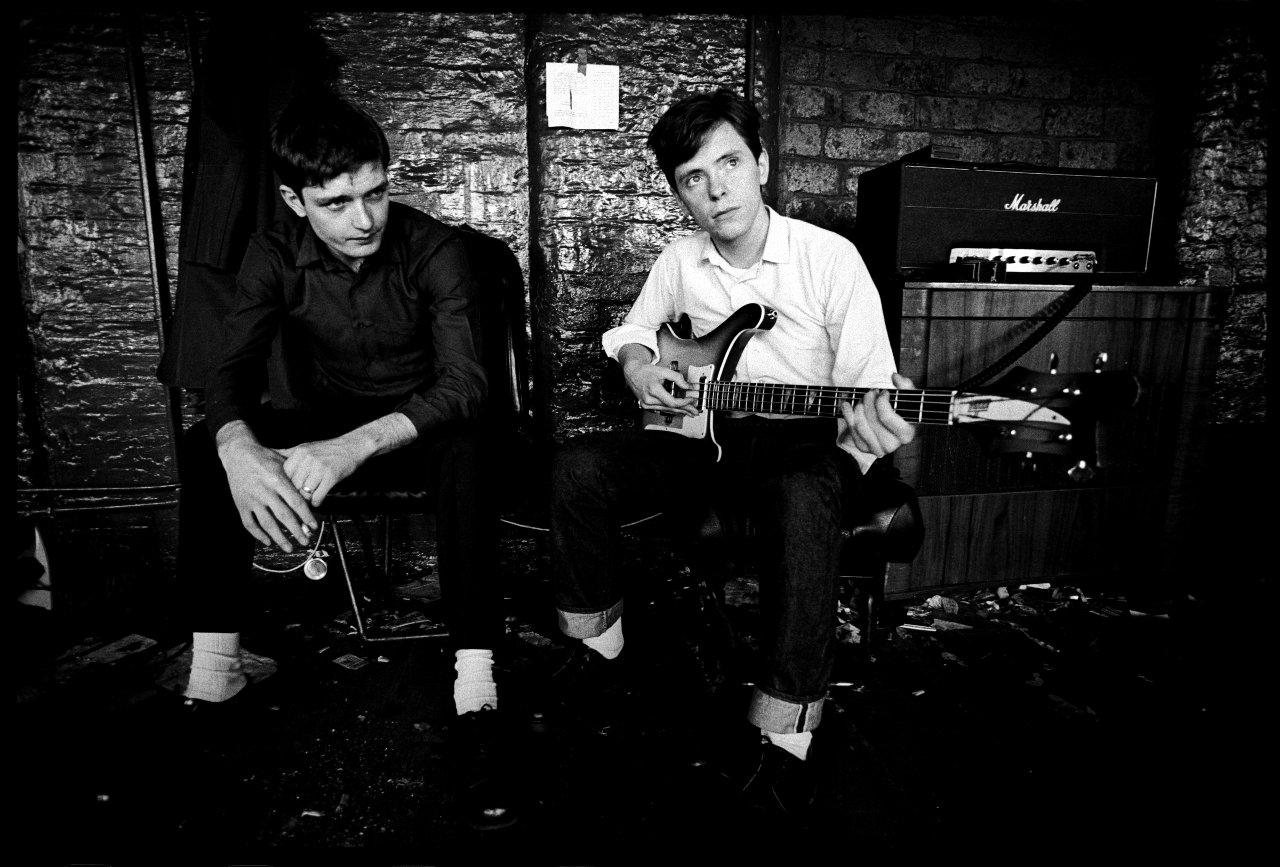 Ian Curtis with guitarist Bernard Sumner, who would go on to front New Order