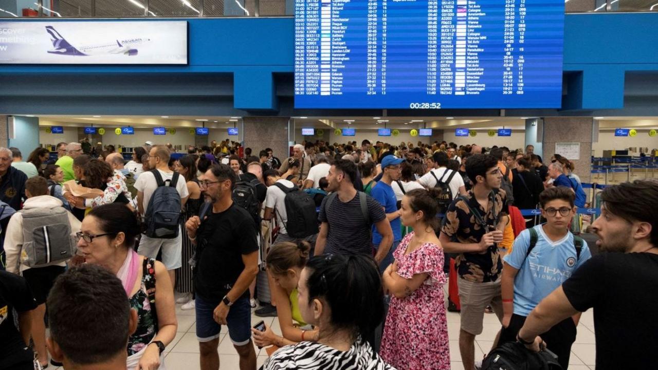 Passengers waiting to board flights away from Rhodes where there are wildfires