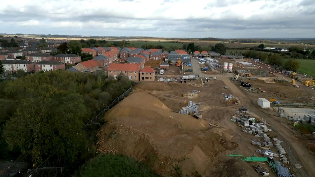 A brown building site, showing the housing estate that is now being built on what was Dinnington Miners Welfare recreation ground