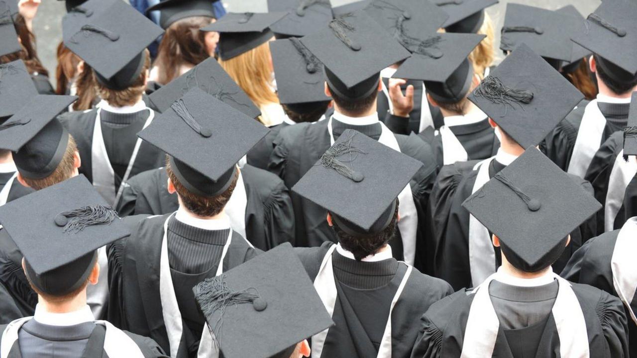 Graduates in mortar boards