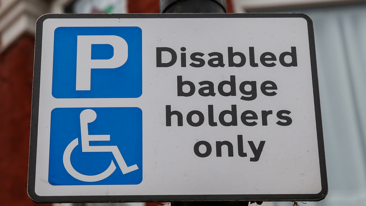 A disabled parking sign