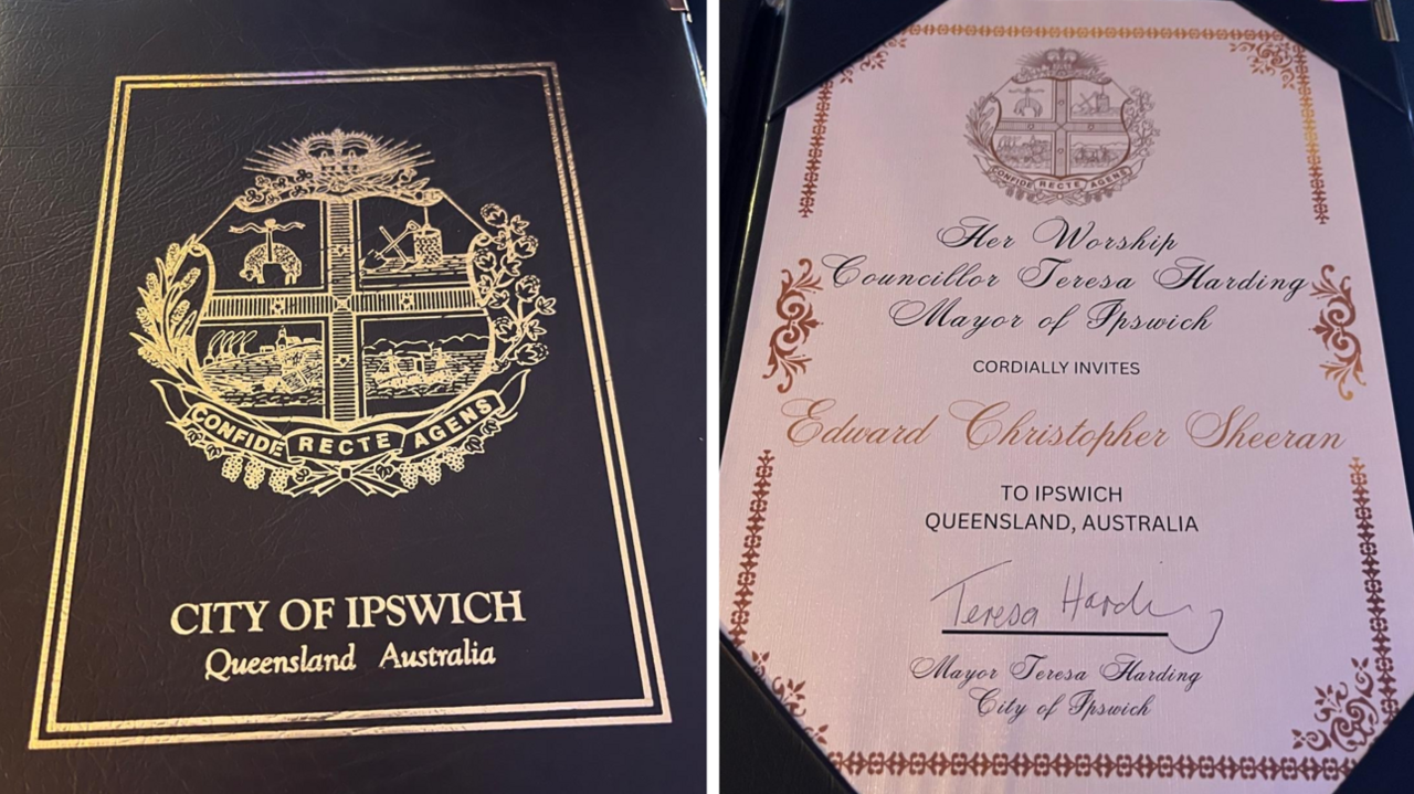 The invitation Teresa Harding, mayor of Ipswich, in Australia, prepared for Ed Sheeran. On the left of the image its black leather cover reads: City of Ipswich Queensland Australia. On the right of the image is the actual document, which reads: the Mayor of Ipswich cordially invites Edward Christopher Sheeran to Ipswich, Queensland, Australia".